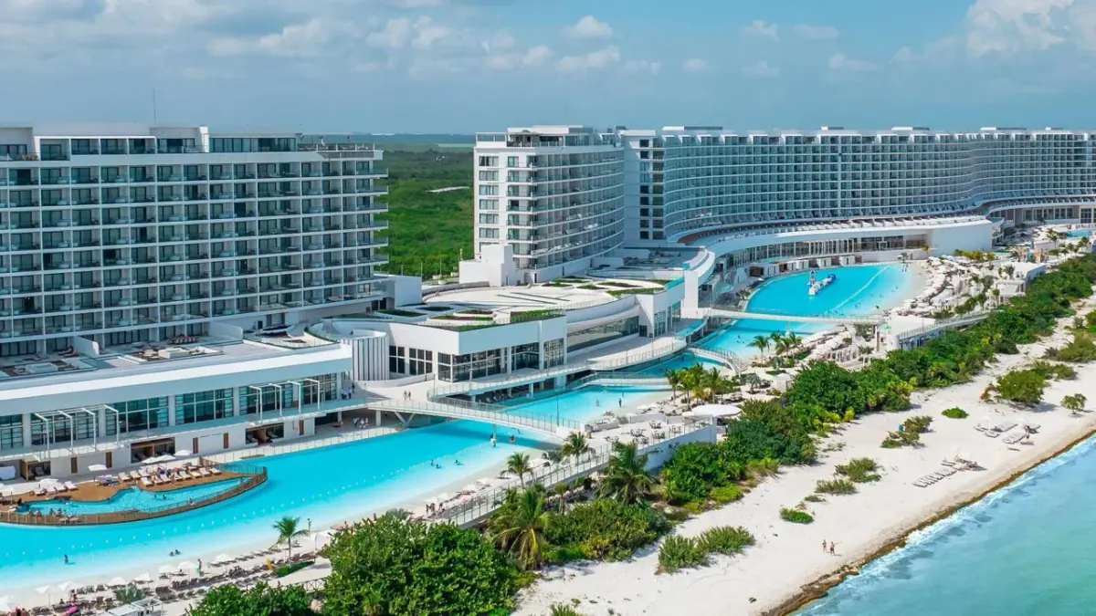 AVA Resort Cancun curving along the Caribbean shoreline